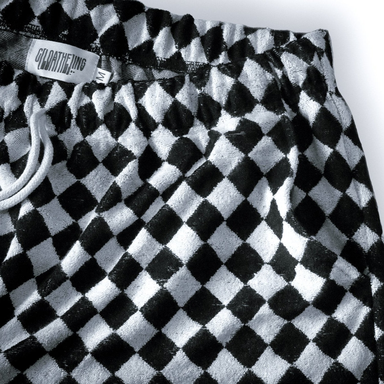 checkered shorts pocket close up